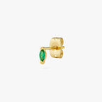The marquise mini stud features a green oblong shaped gem and has gold accents color:null|gold/green