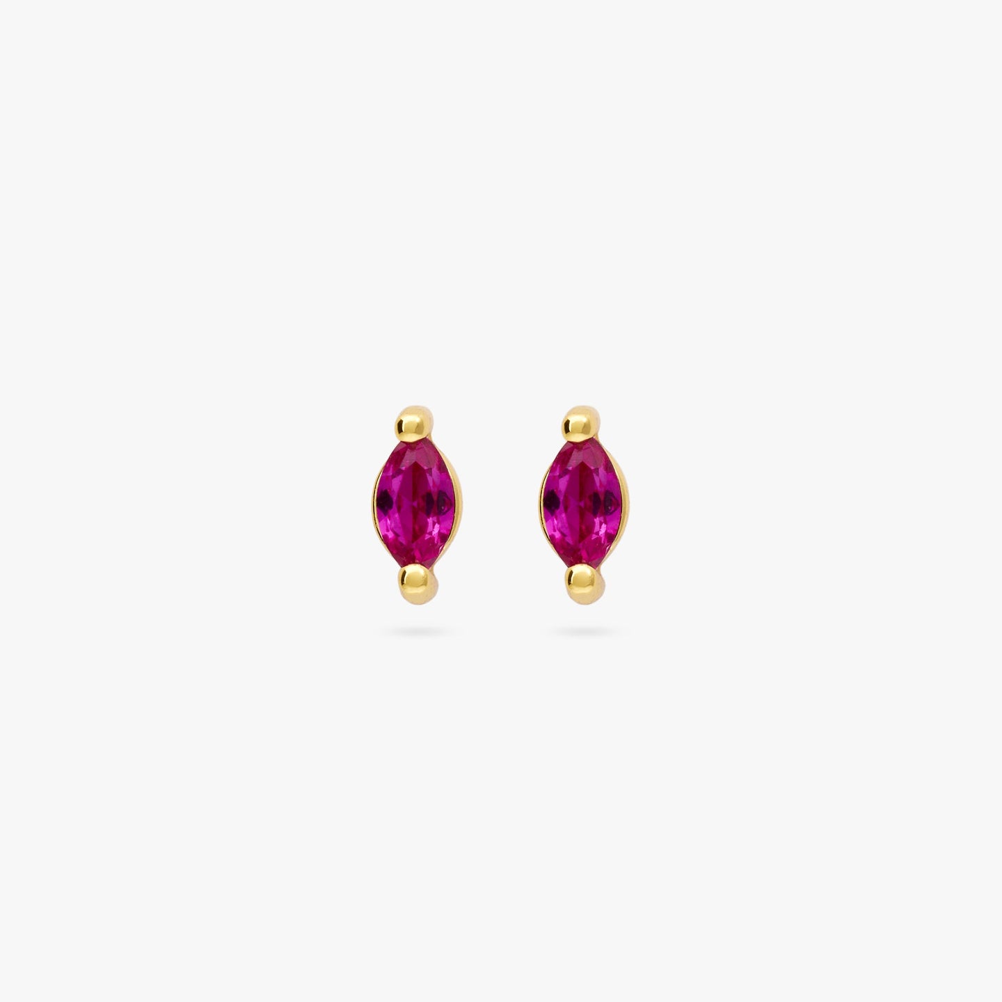 The marquise mini stud features a green oblong shaped gem and has gold accents [pair] color:null|gold/pink