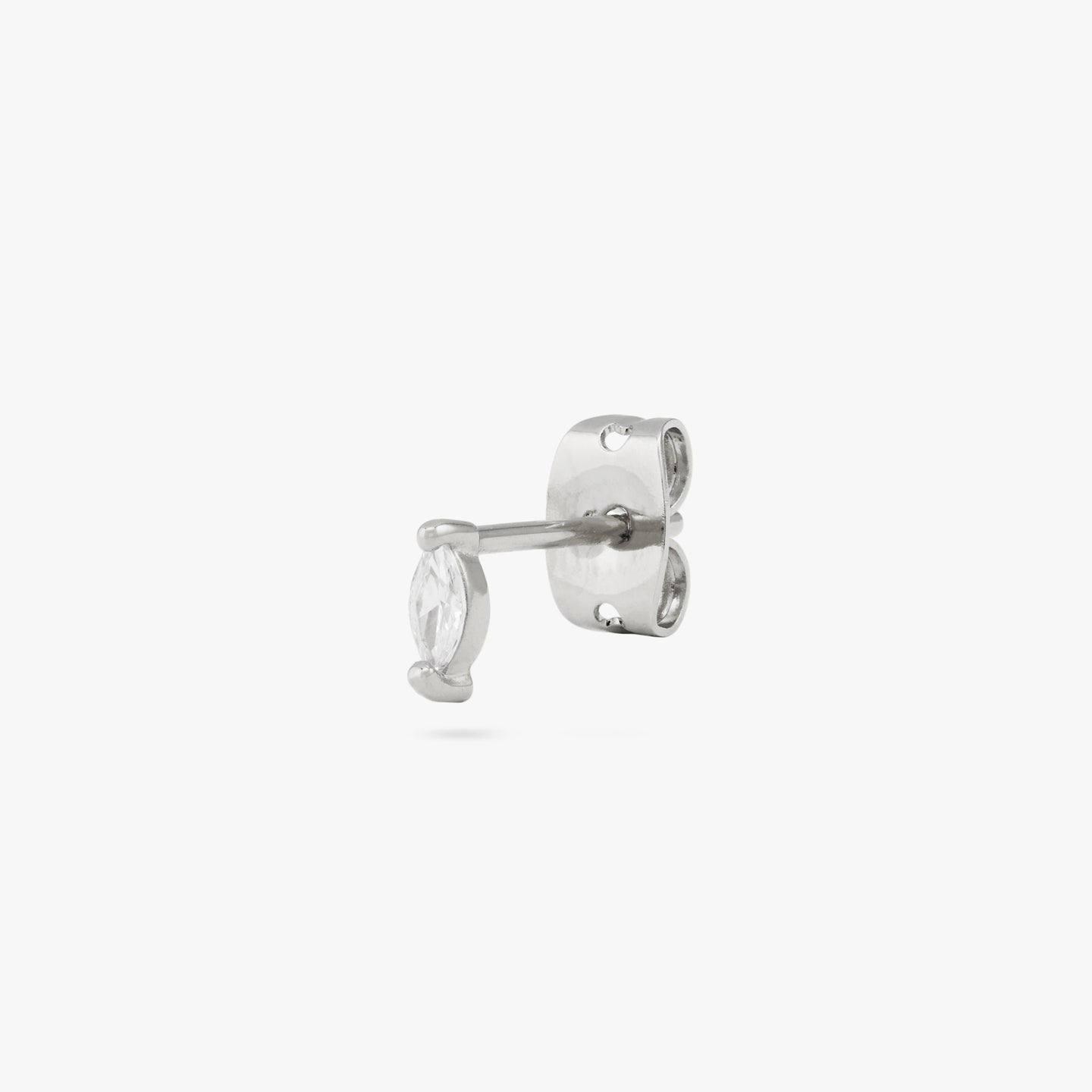 The marquise mini stud features a clear oblong shaped gem and has silver accents color:null|silver/clear