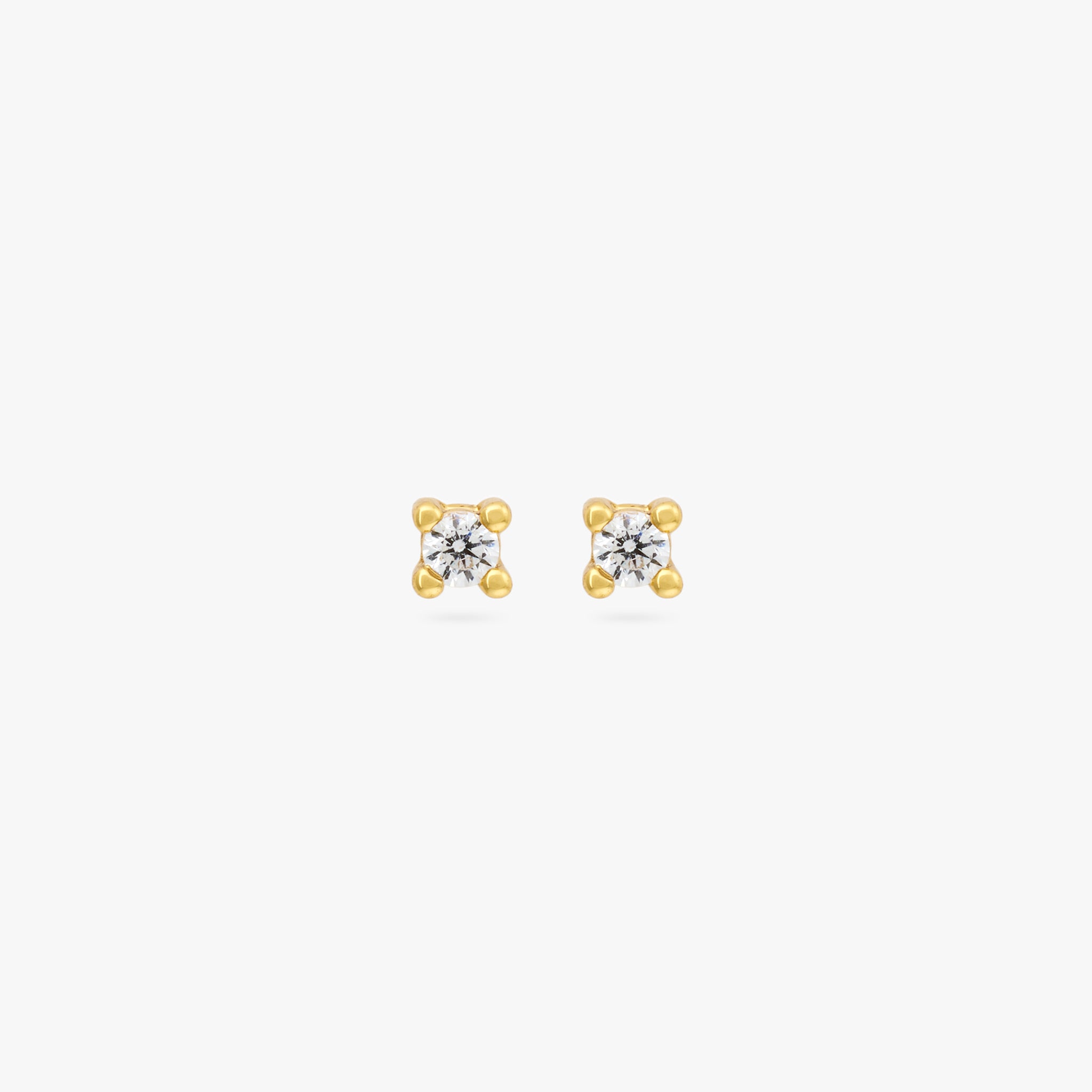 A pair of gold micro studs with a clear cz gems [pair] color:null|gold/clear