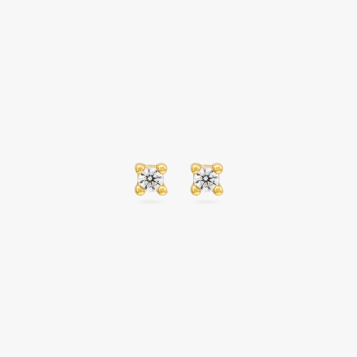 A pair of gold micro studs with a clear cz gems [pair] color:null|gold/clear