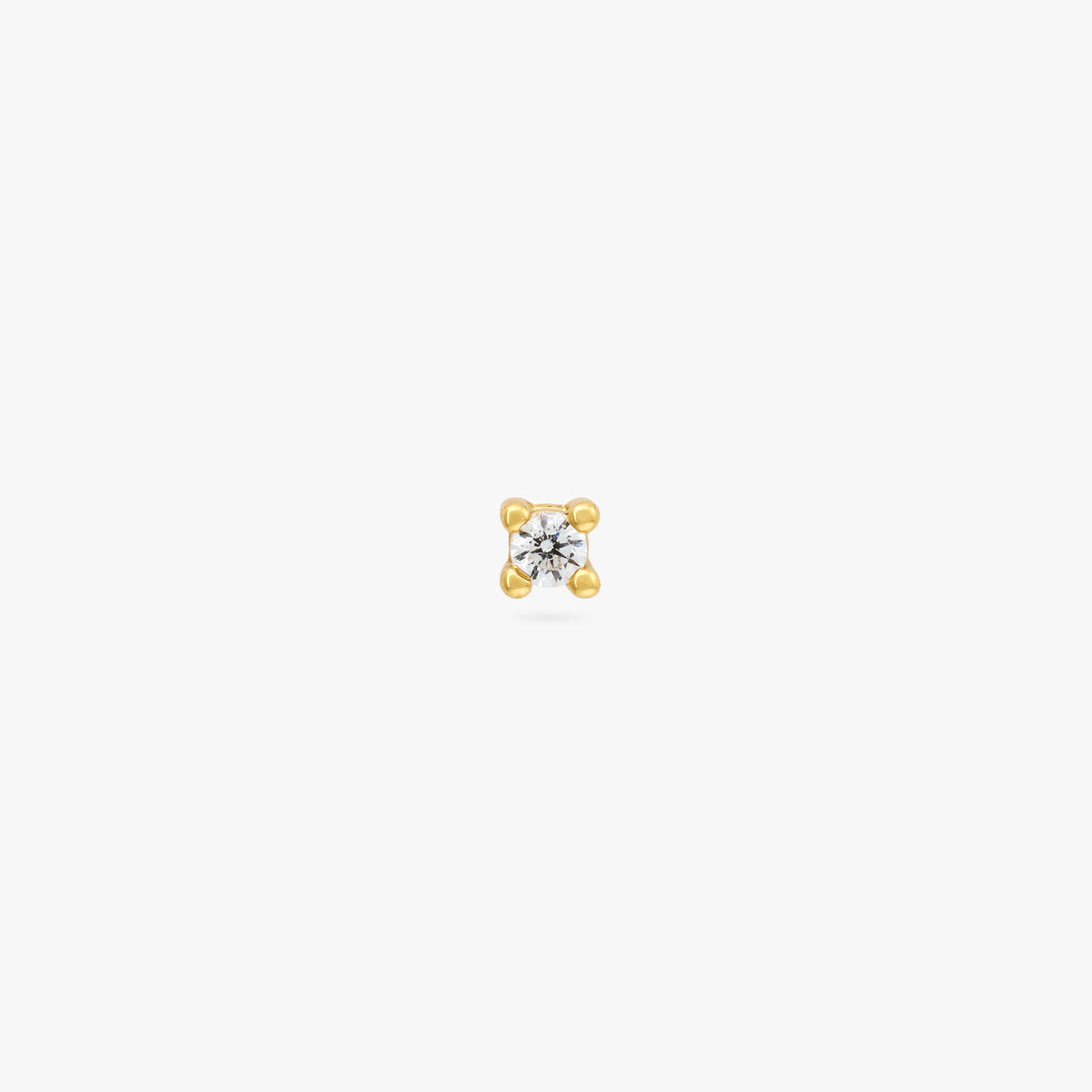 A gold micro stud with a clear cz gem color:null|gold/clear