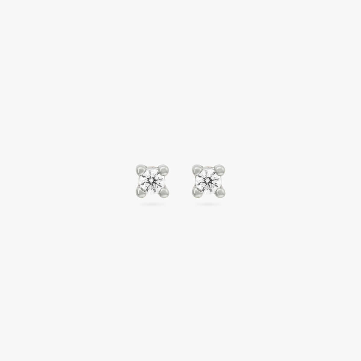 A pair of silver micro studs with a clear cz gems [pair] color:null|silver/clear