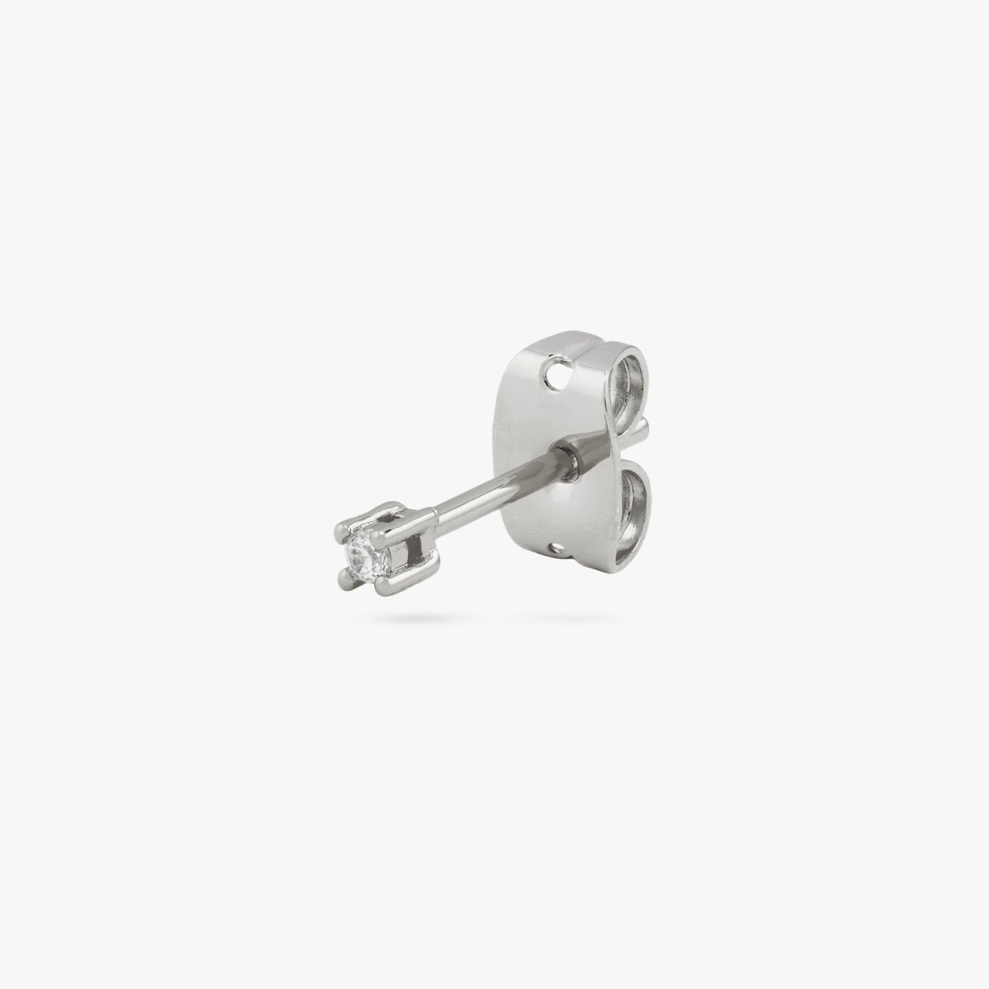 A silver micro stud with a clear cz gem color:null|silver/clear