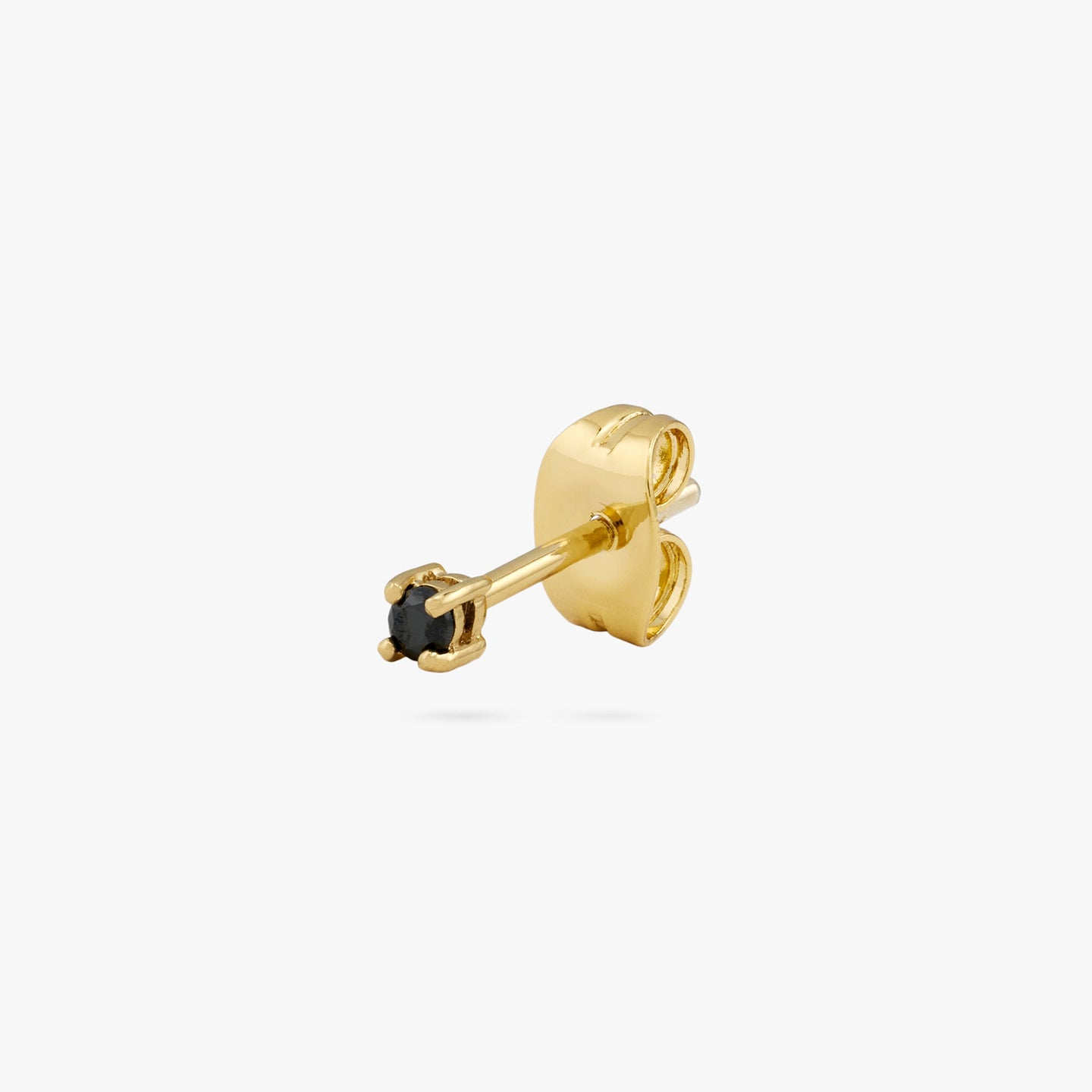 A mini gold stud with a black cz gem color:null|gold/black