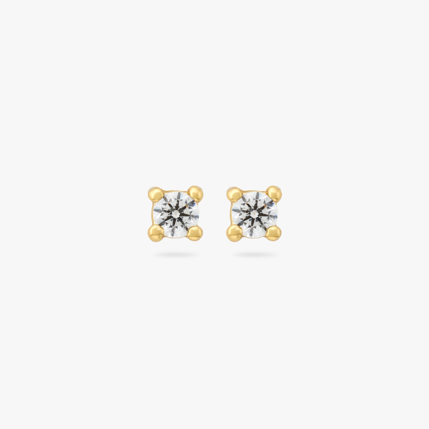 A pair of mini gold studs with clear cz gems [pair] color:null|gold/clear