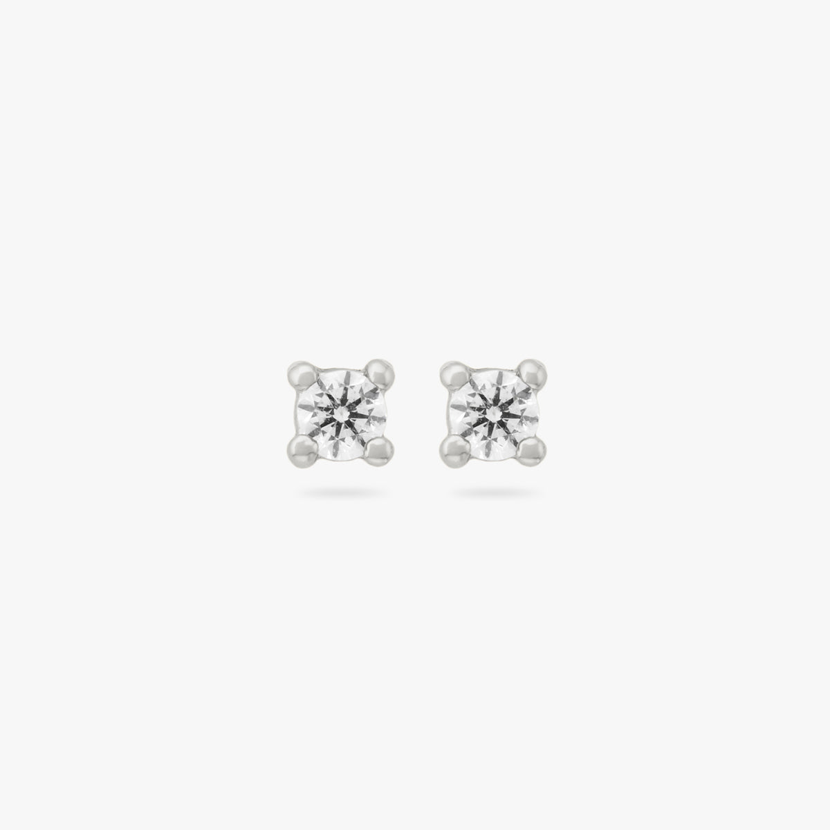 A pair of mini silver studs with clear cz gems [pair] color:null|silver/clear