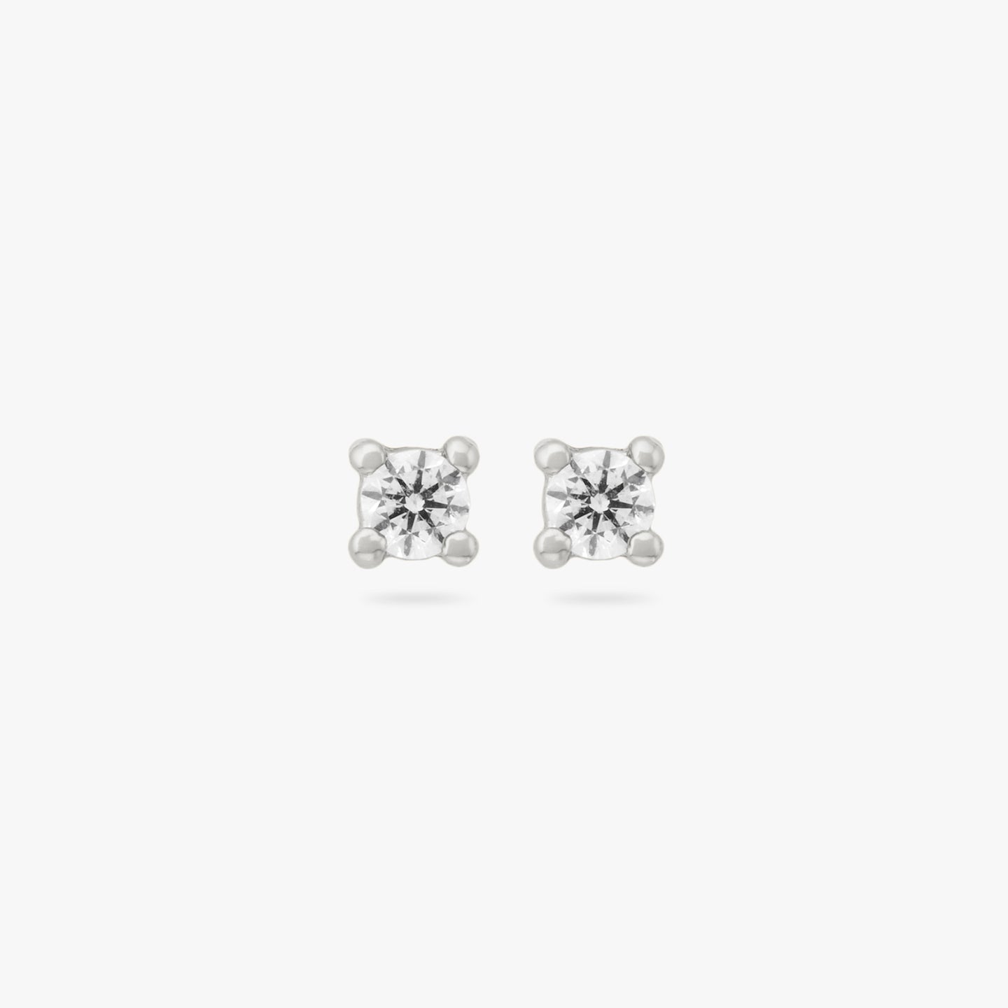 A pair of mini silver studs with clear cz gems [pair] color:null|silver/clear