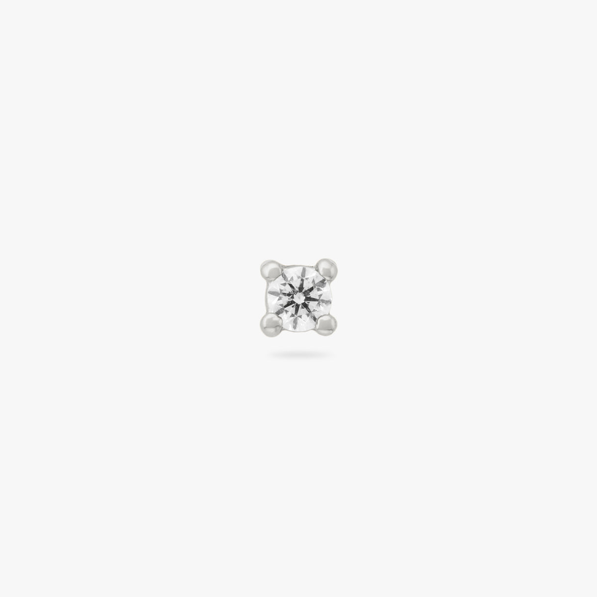 A mini silver stud with a clear cz gem color:null|silver/clear