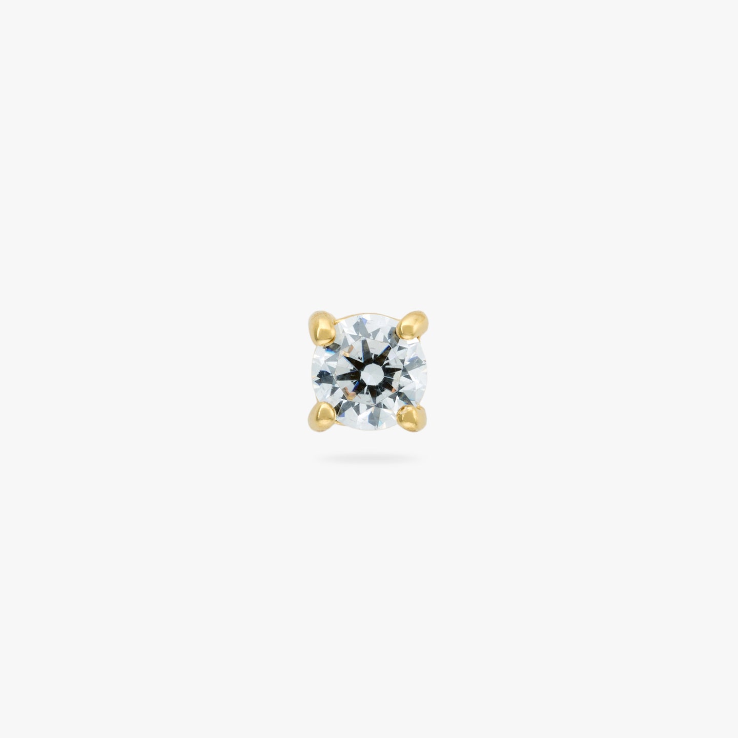 Small CZ stud measuring 3mm. color:null|gold/clear