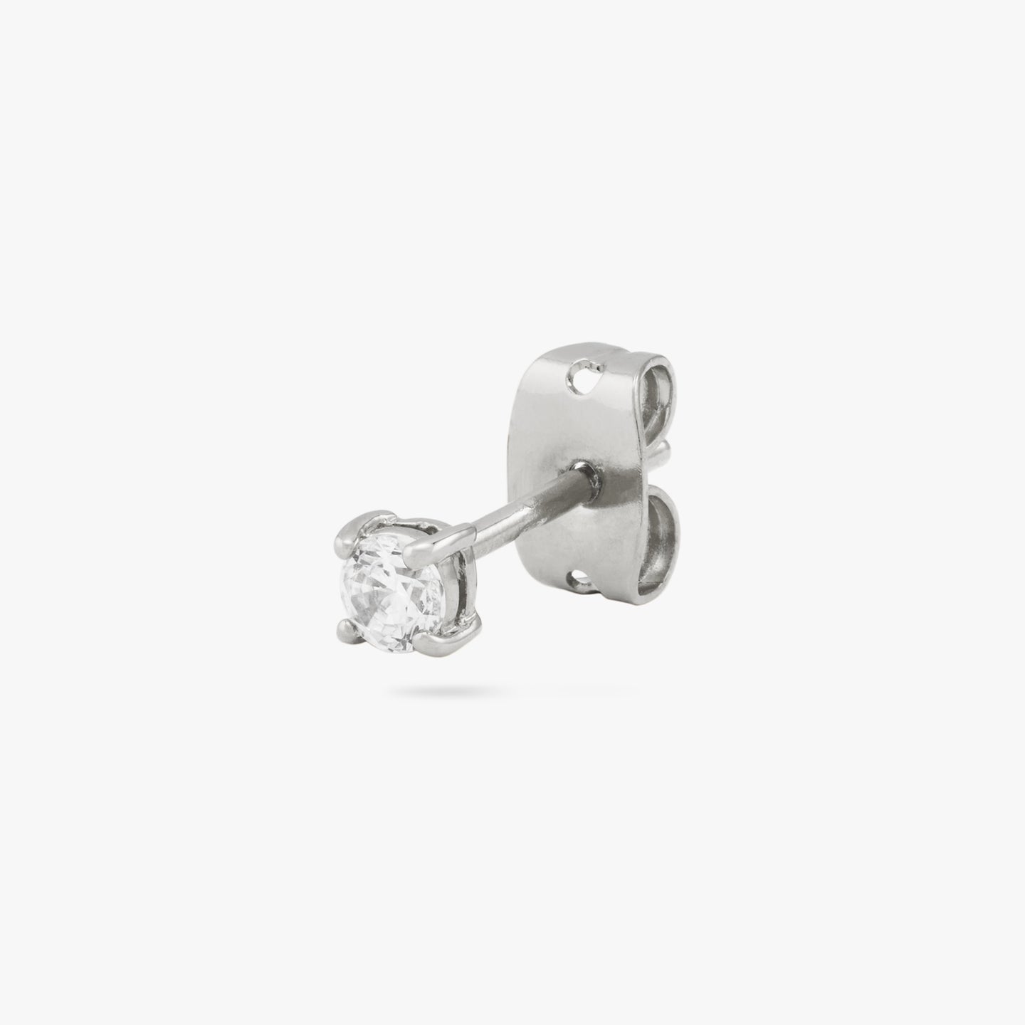 This is a small silver stud with a clear cz accent color:null|silver/clear