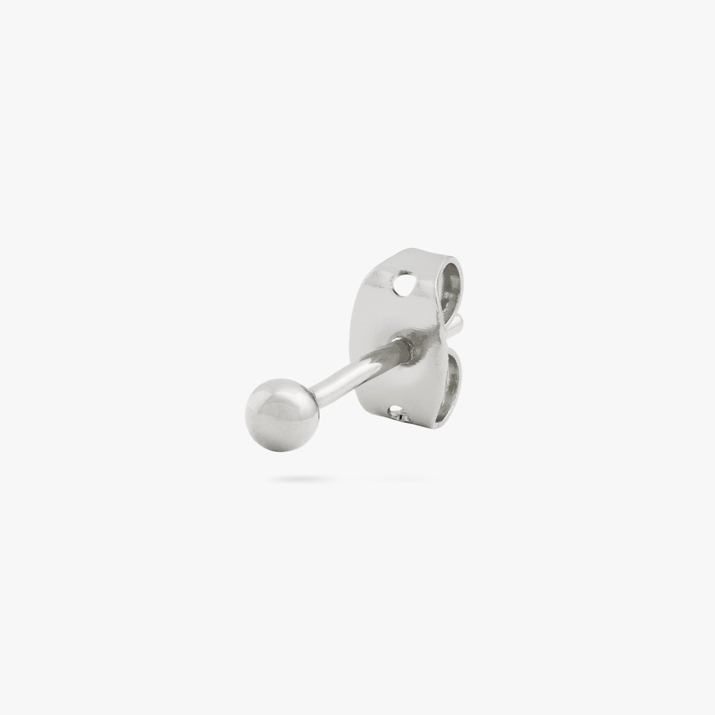A mini silver ball shaped stud color:null|silver