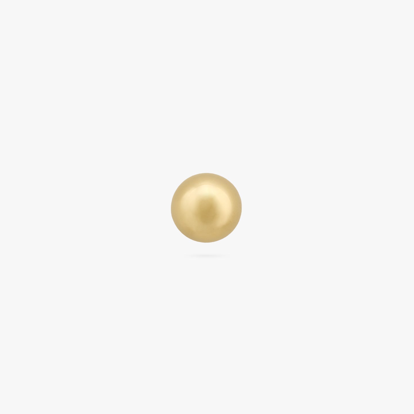 A small gold ball shaped stud color:null|gold
