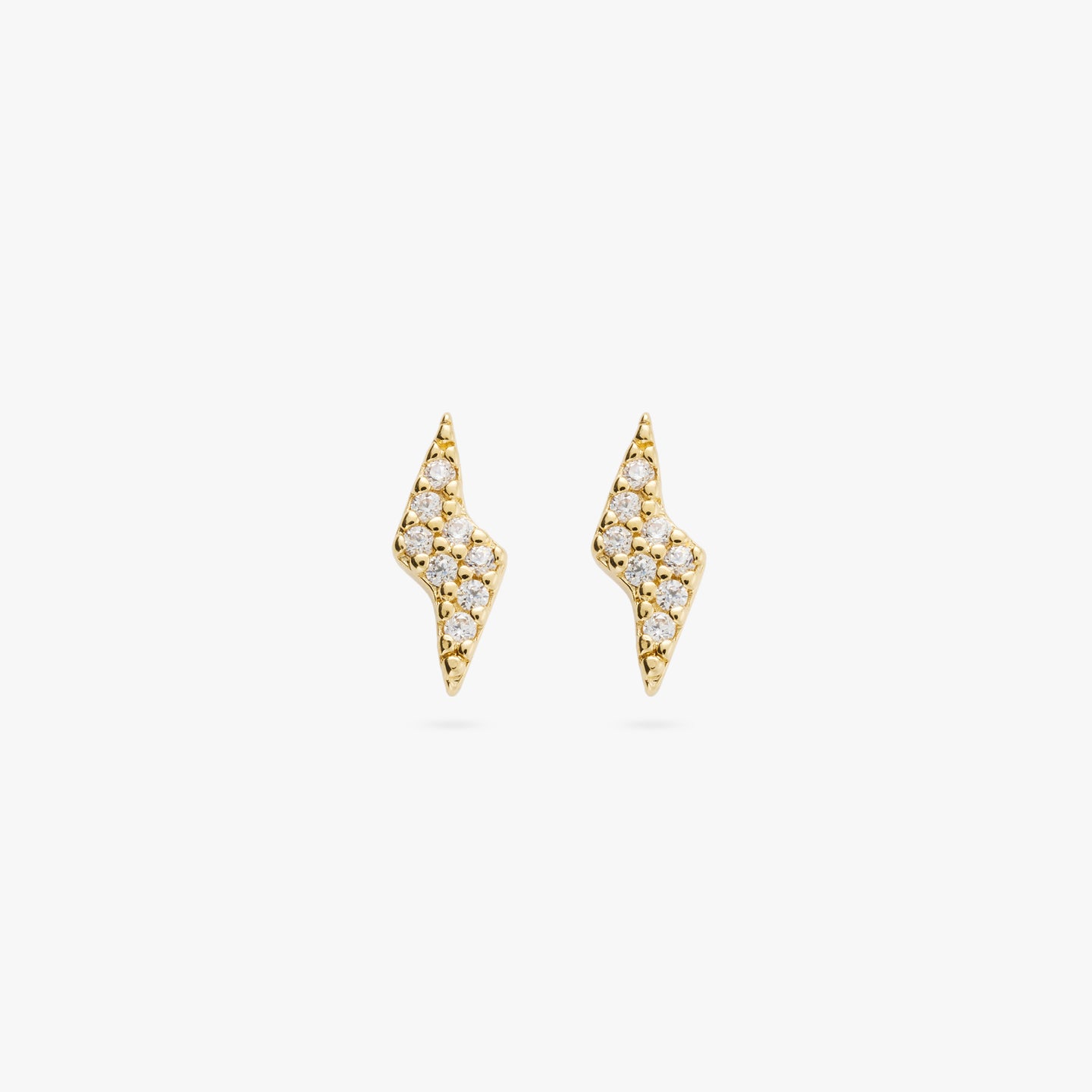 This is a pair of gold gem lined lightning bolt studs [pair] color:null|gold/clear
