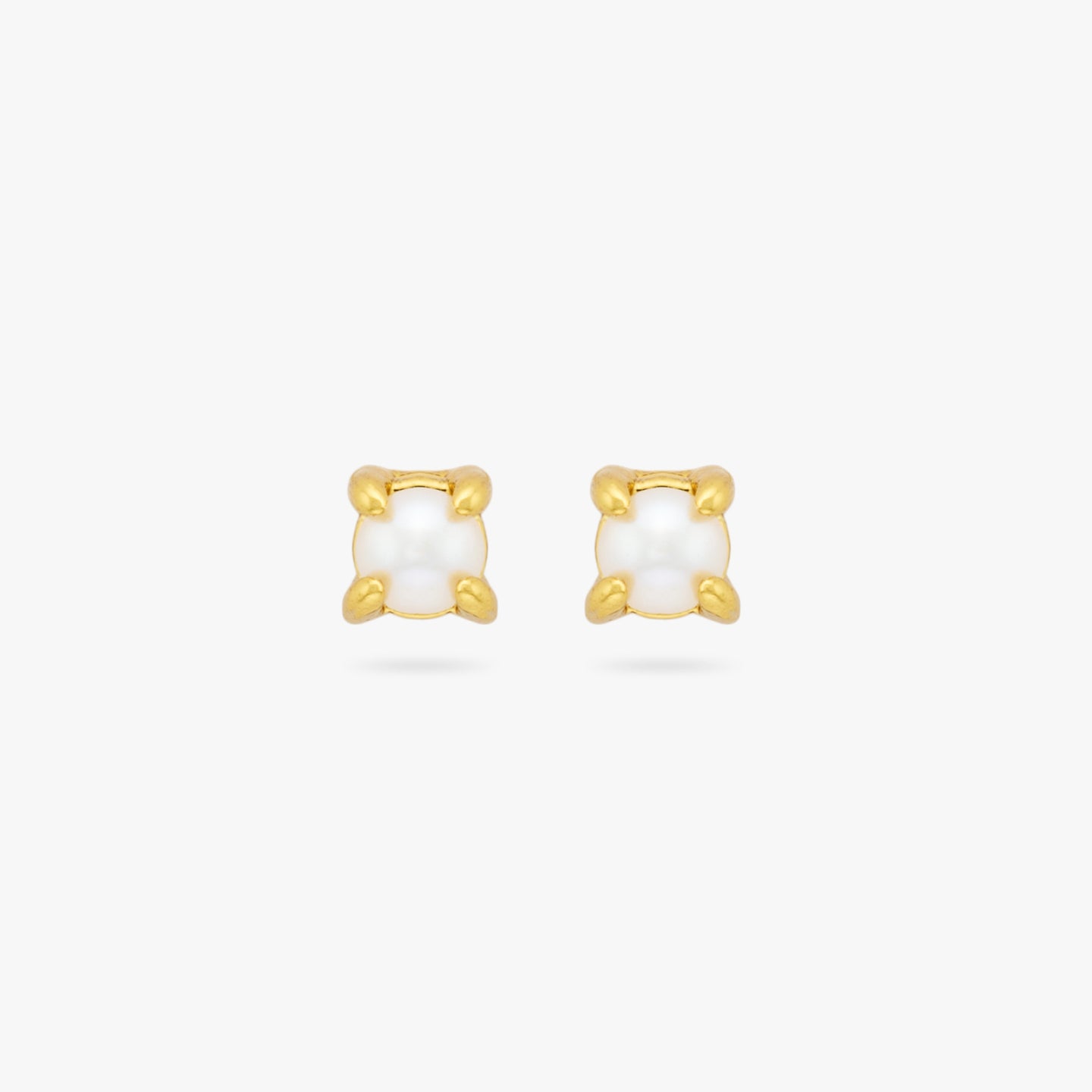 This is a pair of small gold studs with a pearl accents [pair] color:null|gold