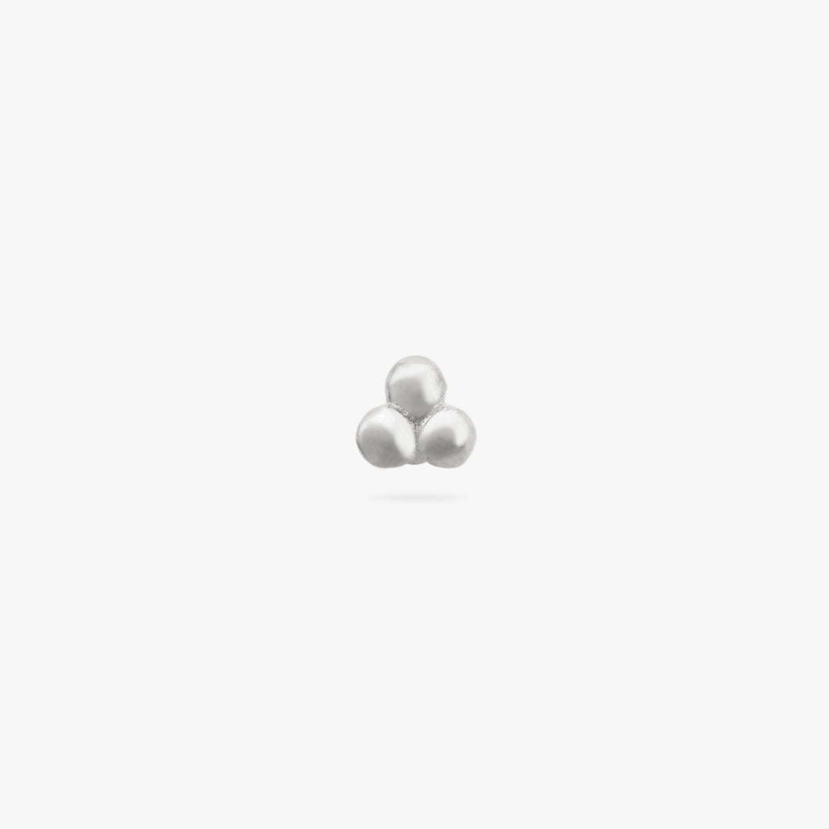 This is a small silver stud of three beads arranged in a cluster color:null|silver