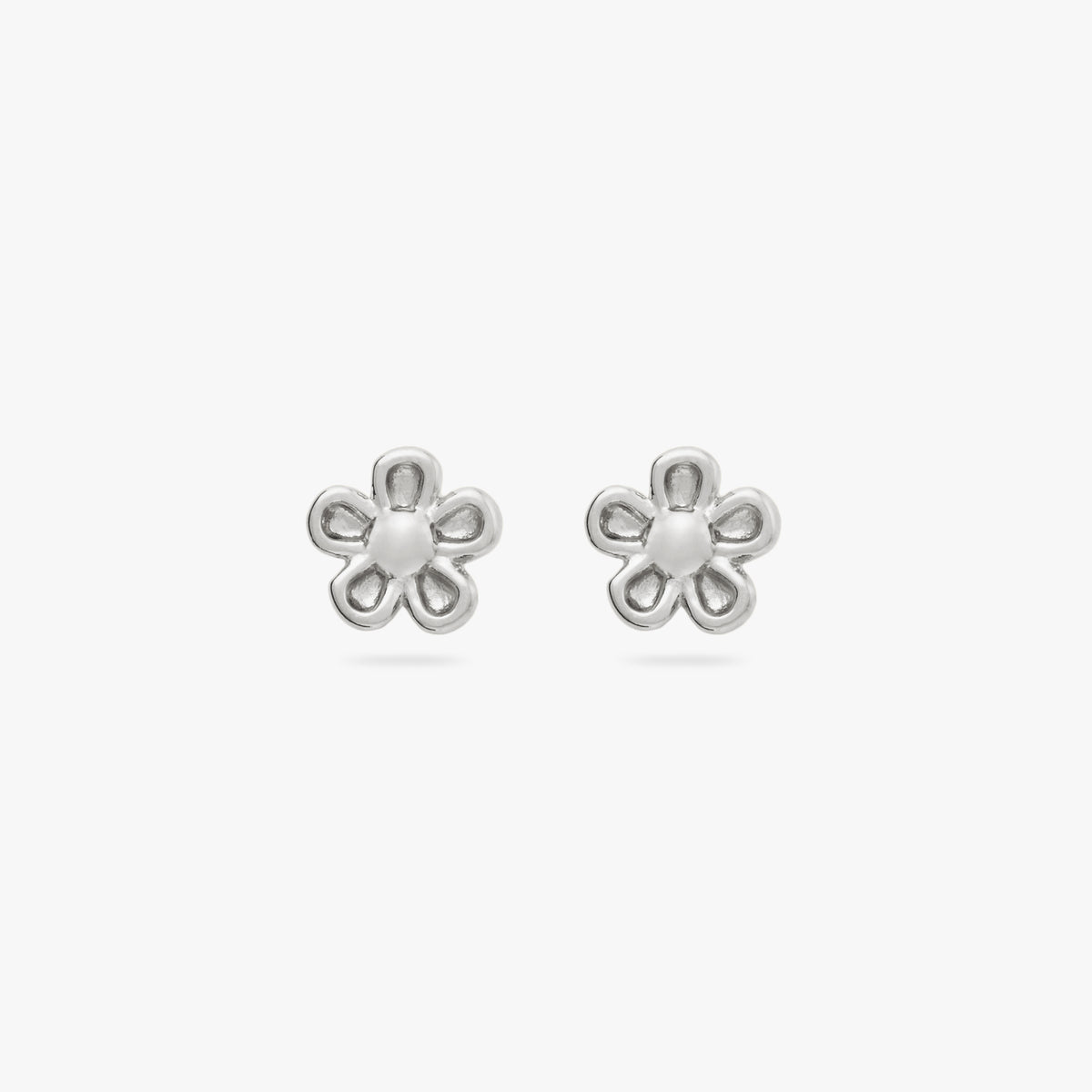 This is a pair of small silver daisy studs [pair] color:null|silver