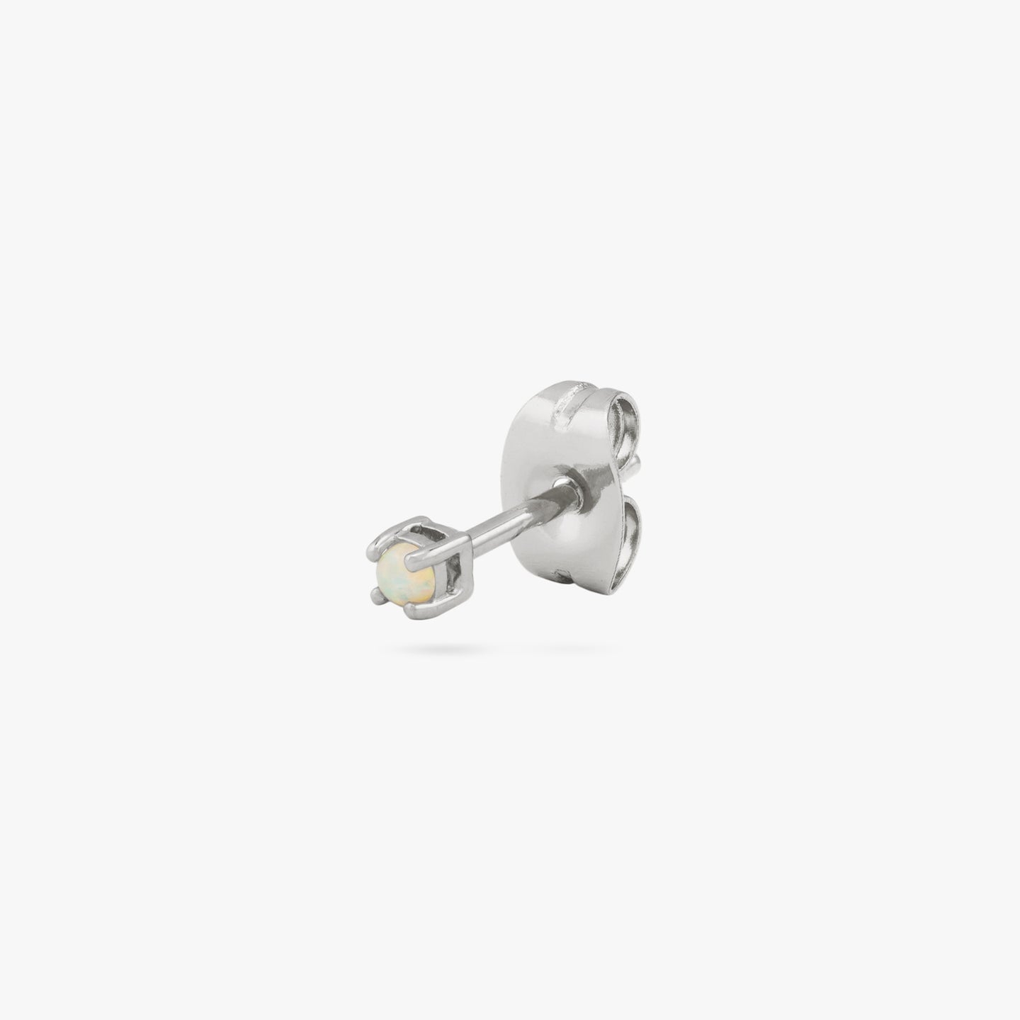 This is a small silver stud with an opal color:null|silver/opal