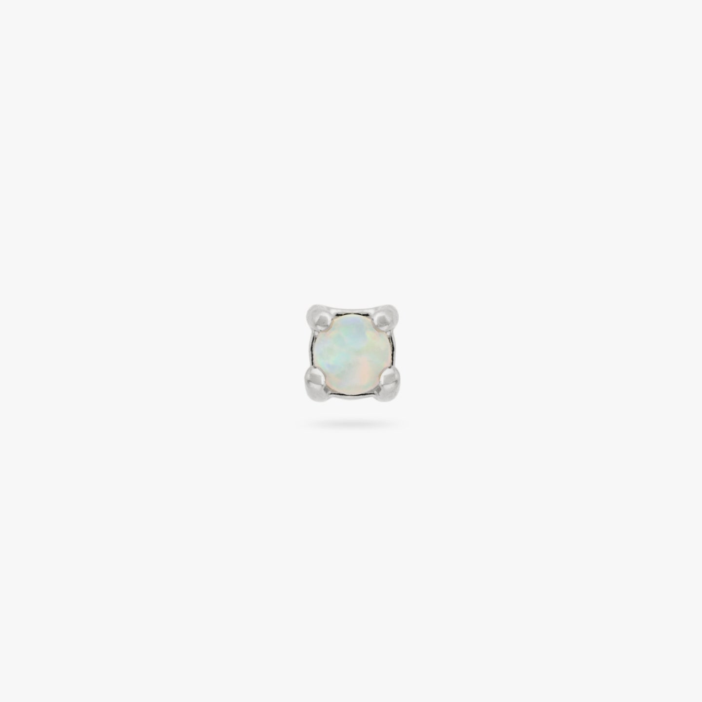 This is a small silver stud with an opal color:null|silver/opal