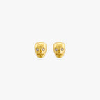 This is a pair of micro sized gold skull studs with cz eyes 