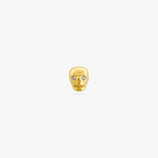 This is a micro sized gold skull stud with cz eyes color