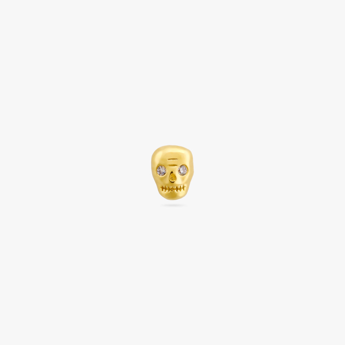 This is a micro sized gold skull stud with cz eyes color