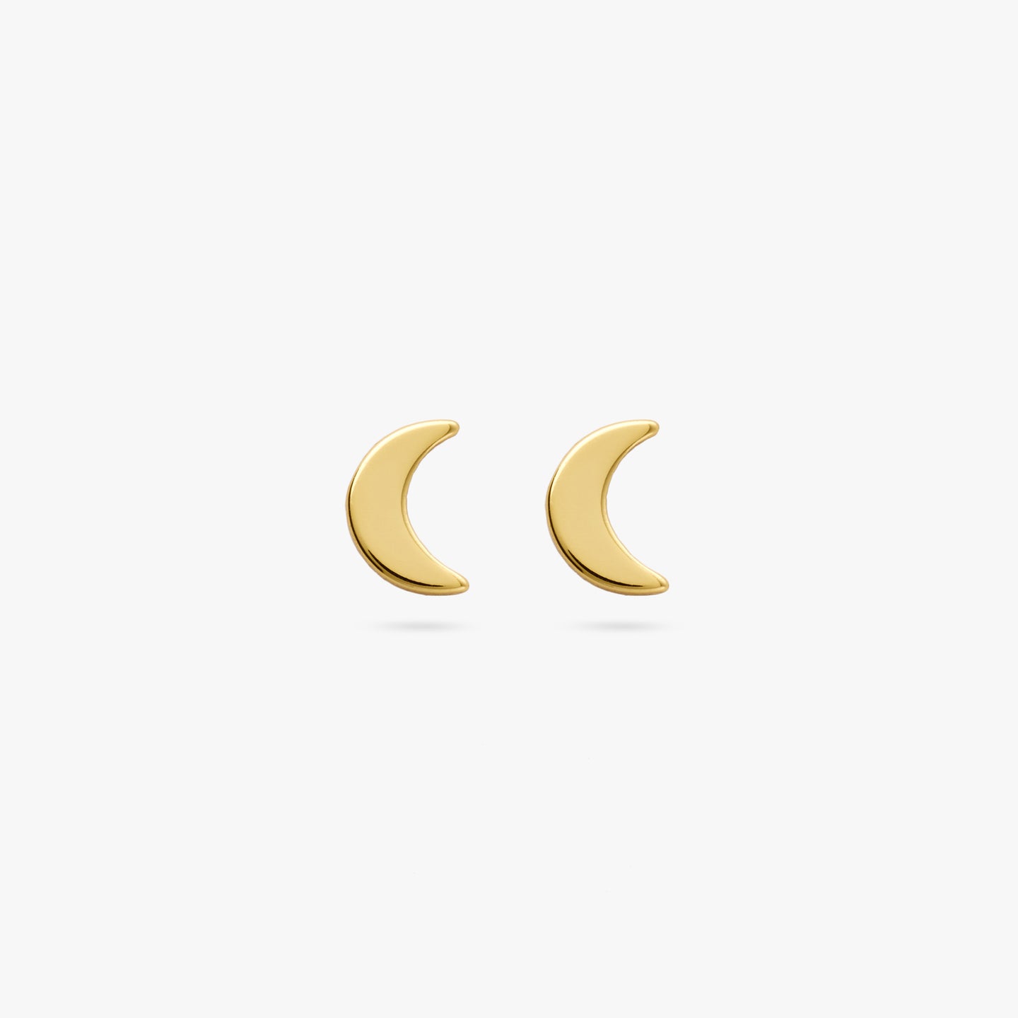 A pair of gold small moon shaped studs [pair] color:null|gold