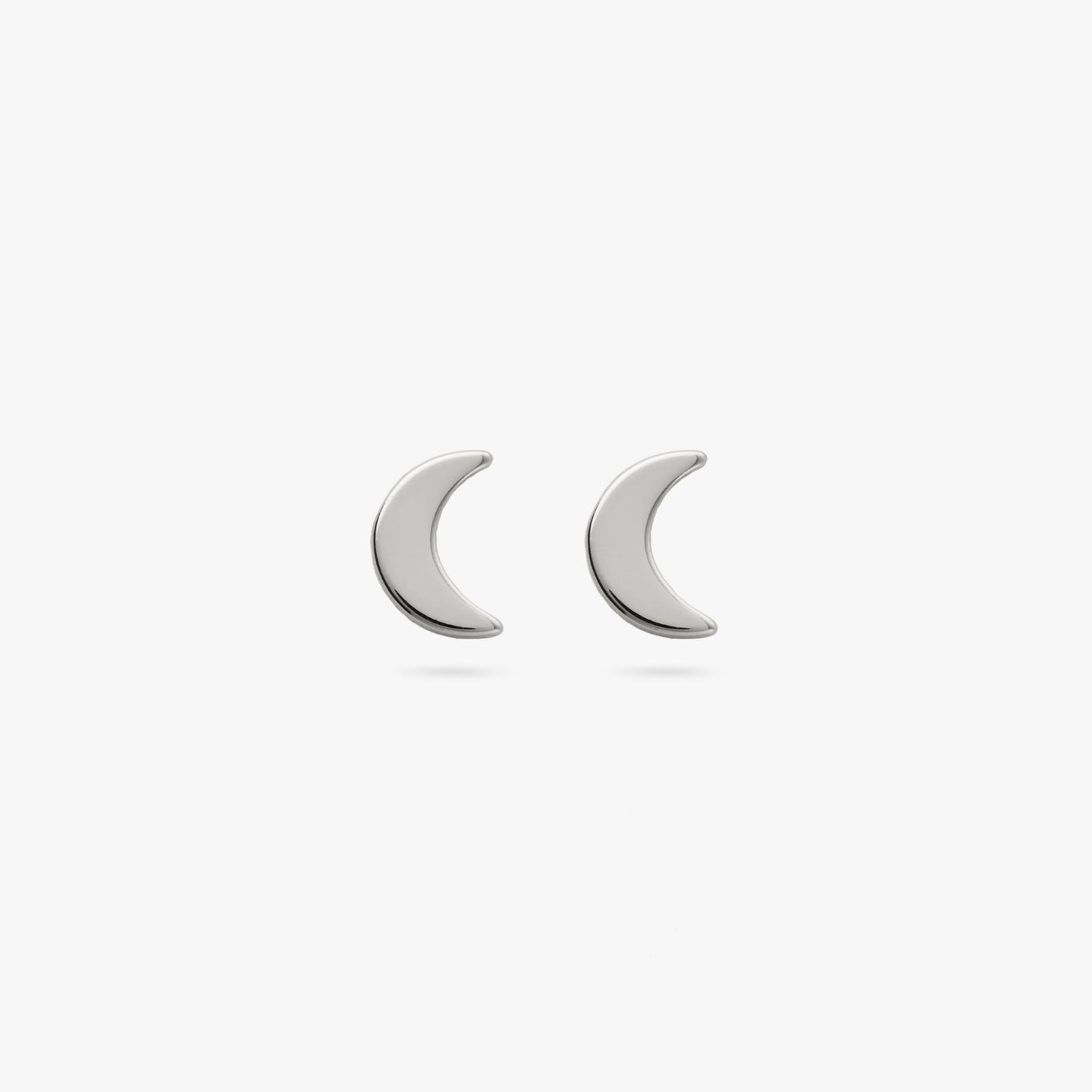 A pair of silver small moon shaped studs [pair] color:null|silver