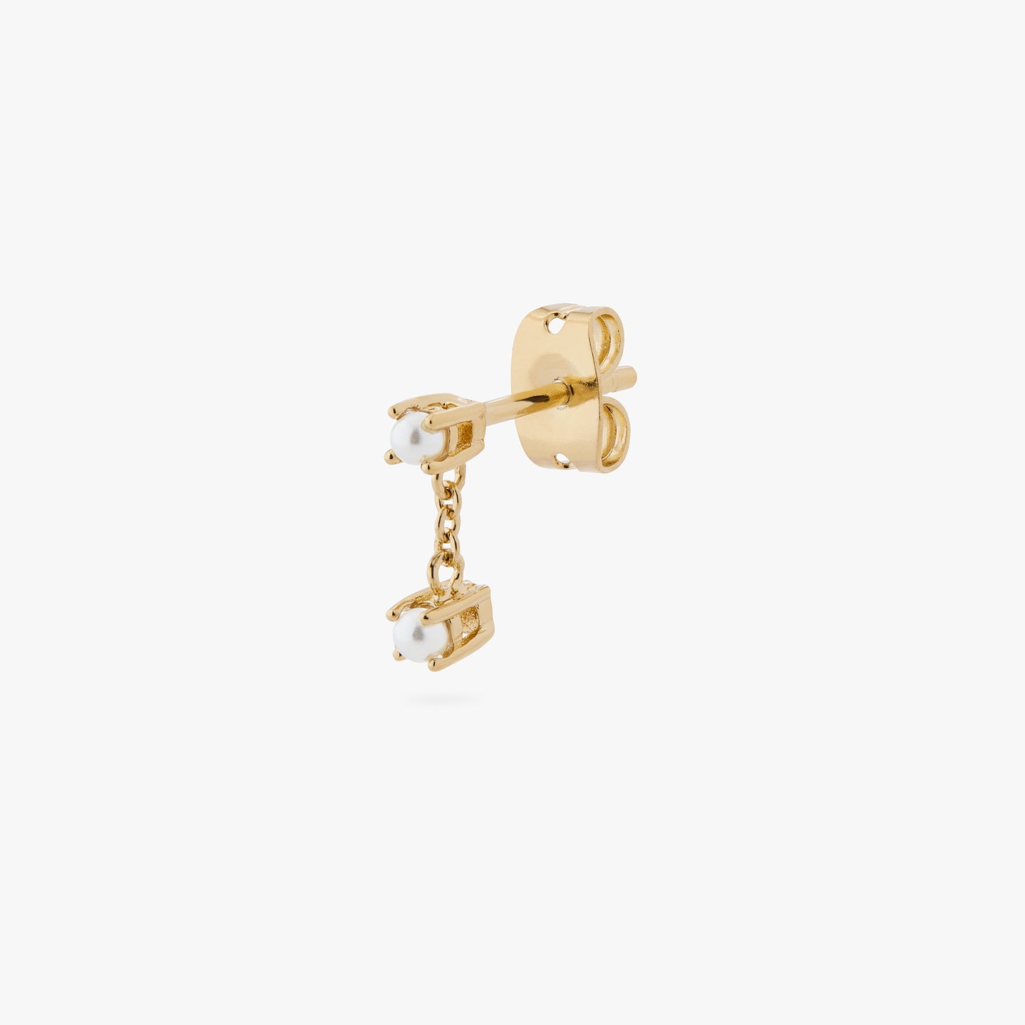 a gold pearl stud with a gold chain connecting it to another pearl color:null|gold