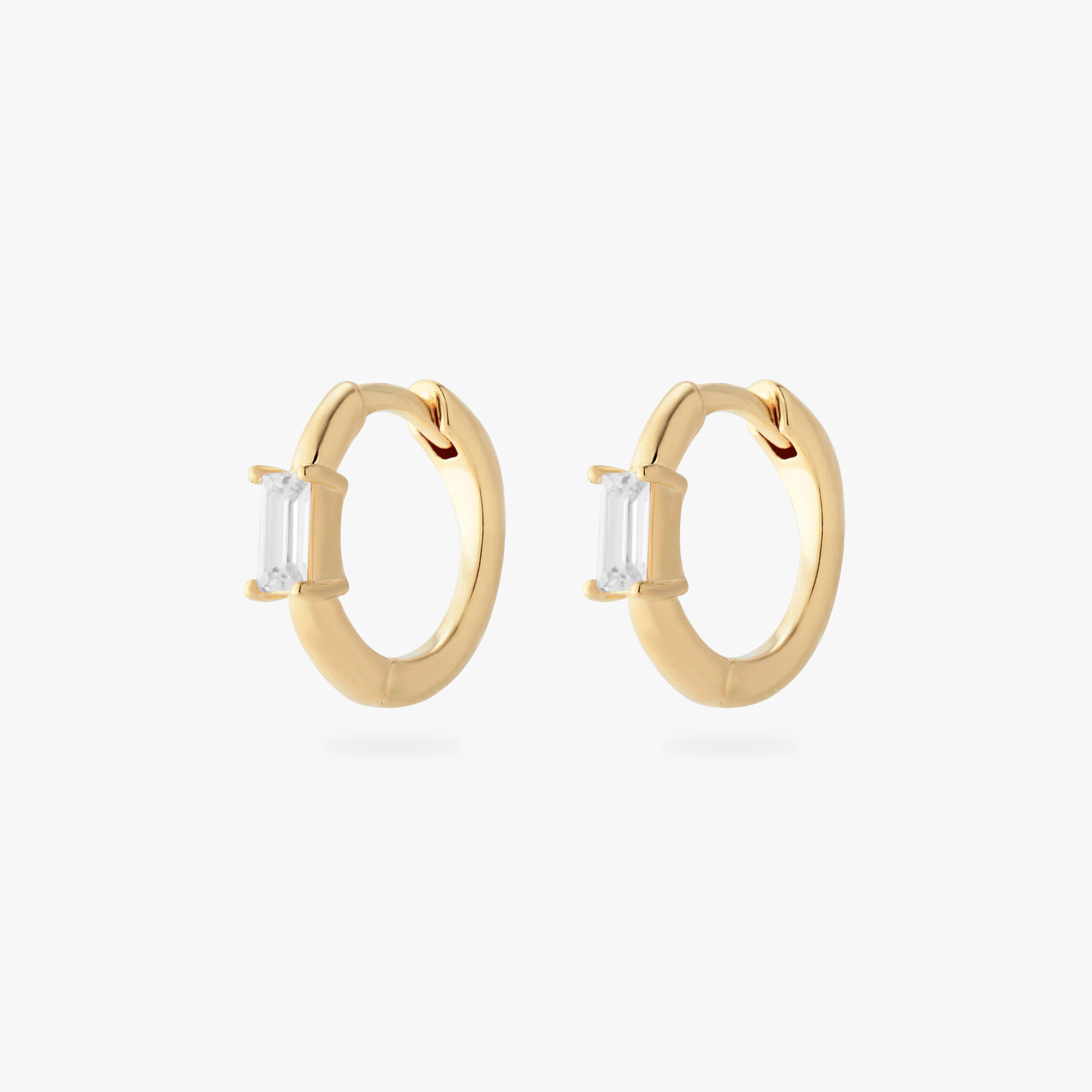 a pair of gold small slim huggies with clear CZs [pair] color:null|gold/clear