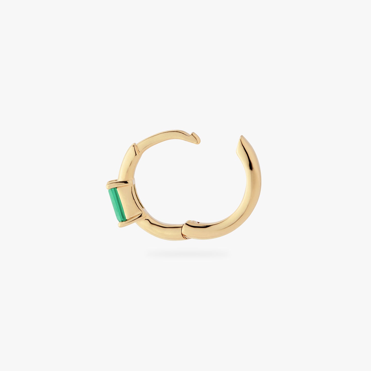 a gold small slim huggie with a green baguette cz color:null|gold/green