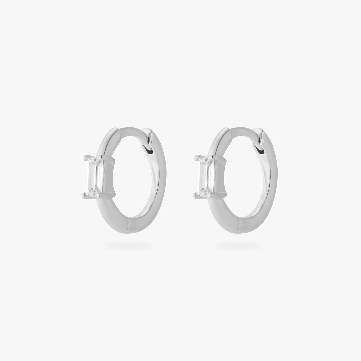 a pair of silver slim huggies with clear baguette shaped CZs [pair] color:null|silver/clear