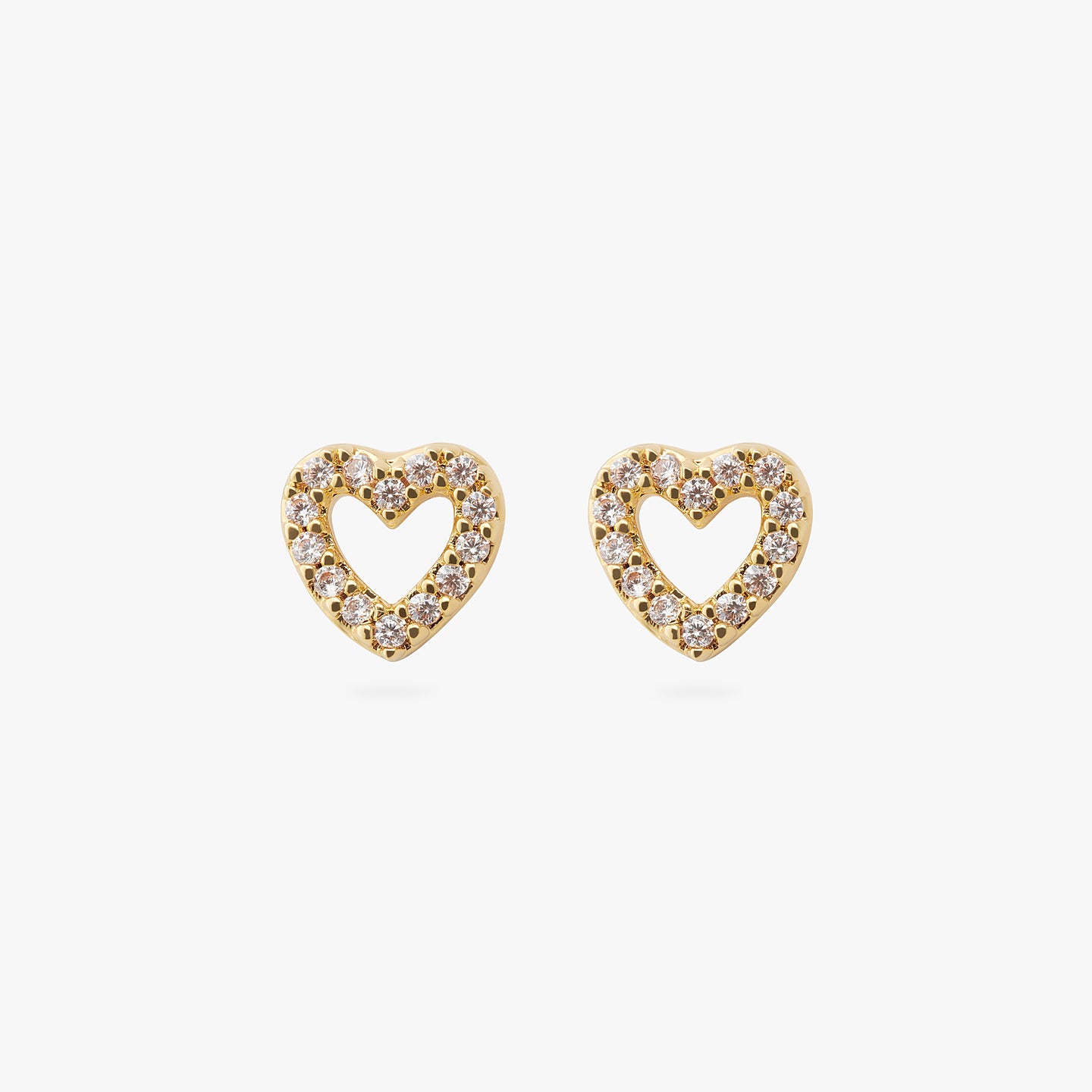 a pair of gold studs consisting of CZs in the shape of a heart [pair] color:null|gold/clear