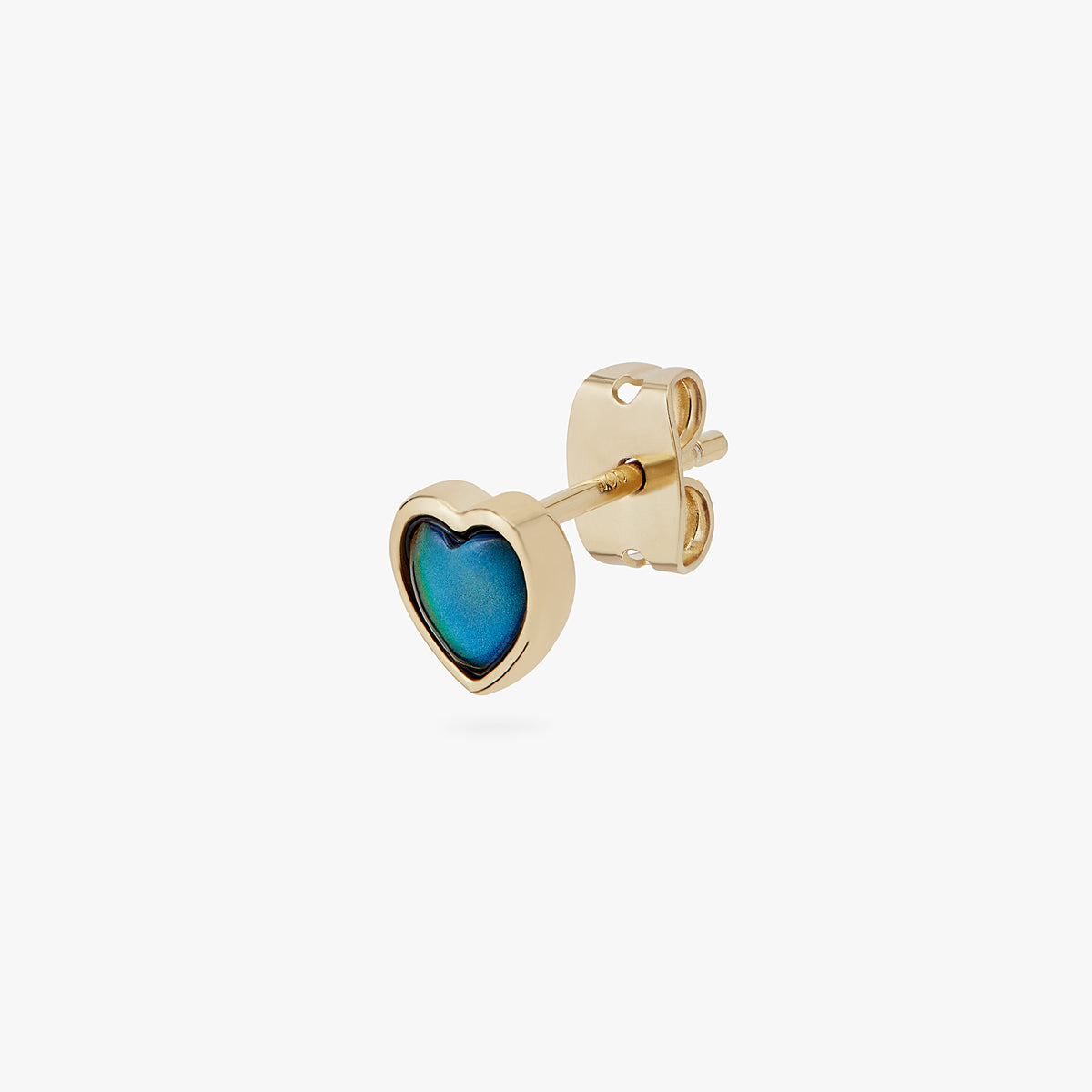 a gold stud in the shape of a heart with a color changing mood stone 