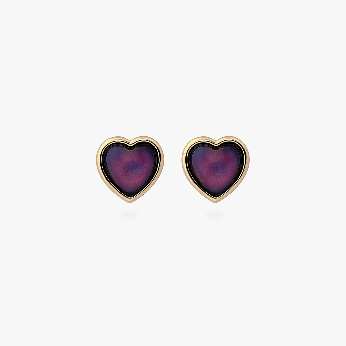 a pair of gold studs in the shape of hearts with color changing mood stones 